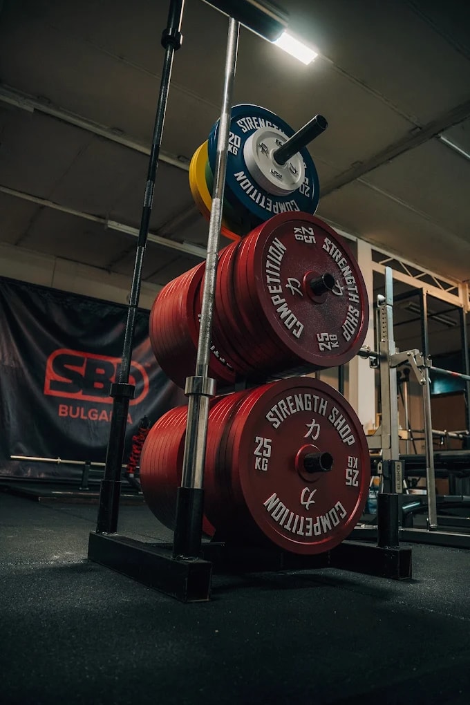 Strength Squad HQ — competition barbells and calibrated plates